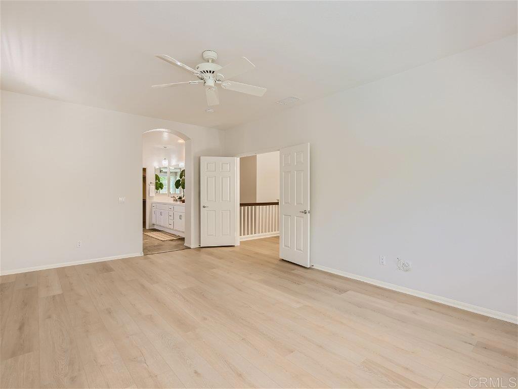 6562 Windflower Drive Carlsbad, CA 92011 - Photo 15 of 28 wooden floor in an empty room