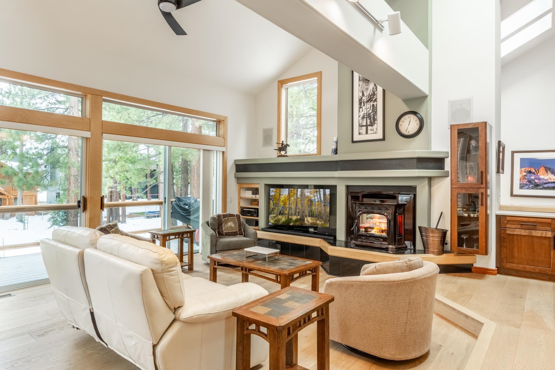 244 Ridge Way Mammoth Lakes, CA 93546 - Photo 6 of 49 Living area with light wood-type flooring, a ceiling fan, and lofted ceiling