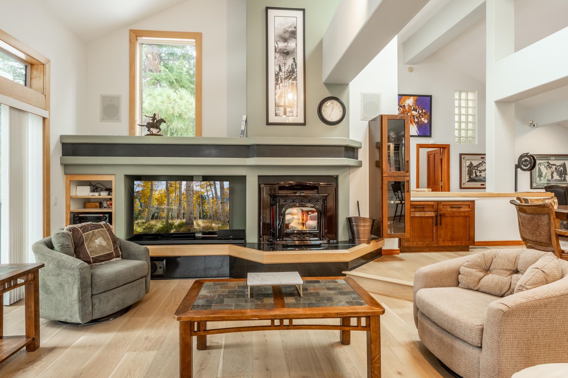 244 Ridge Way Mammoth Lakes, CA 93546 - Photo 8 of 49 Living area with lofted ceiling and wood finished floors