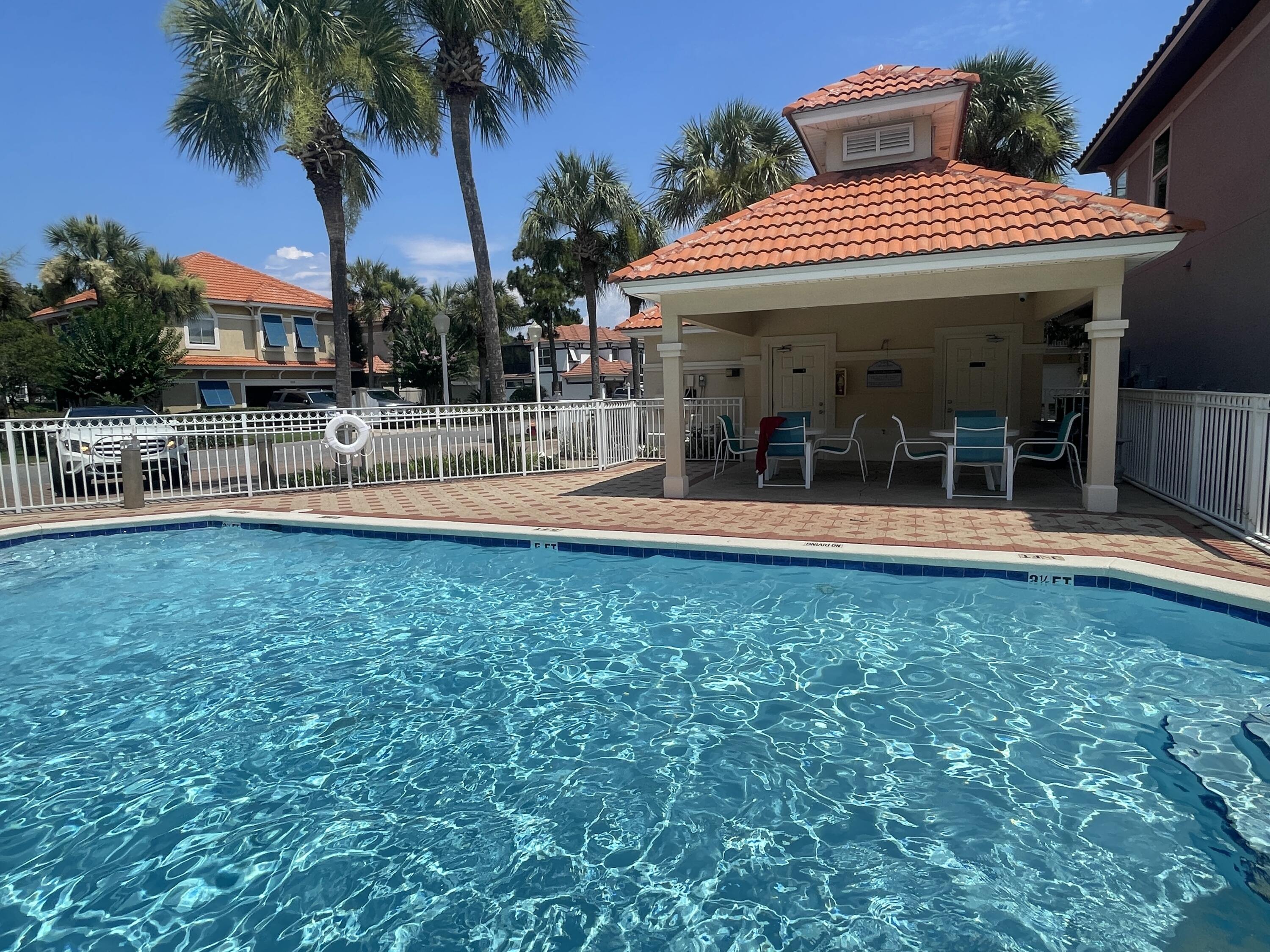 241 Inverrary Drive Destin, FL 32541 - Photo 2 of 24 a view of a house with a swimming pool
