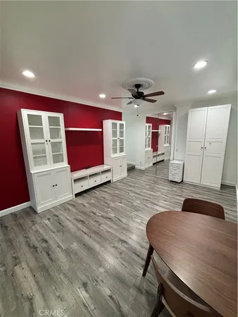 a living room with a couch and a flat screen tv