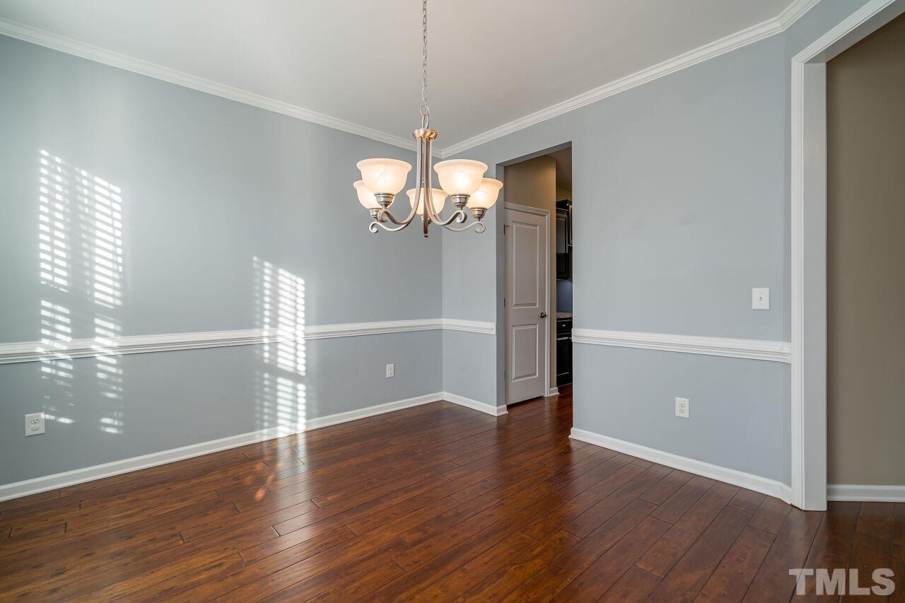 1323 Rodessa Run Raleigh, NC 27607 - Photo 15 of 29 a view of a livingroom with wooden floor