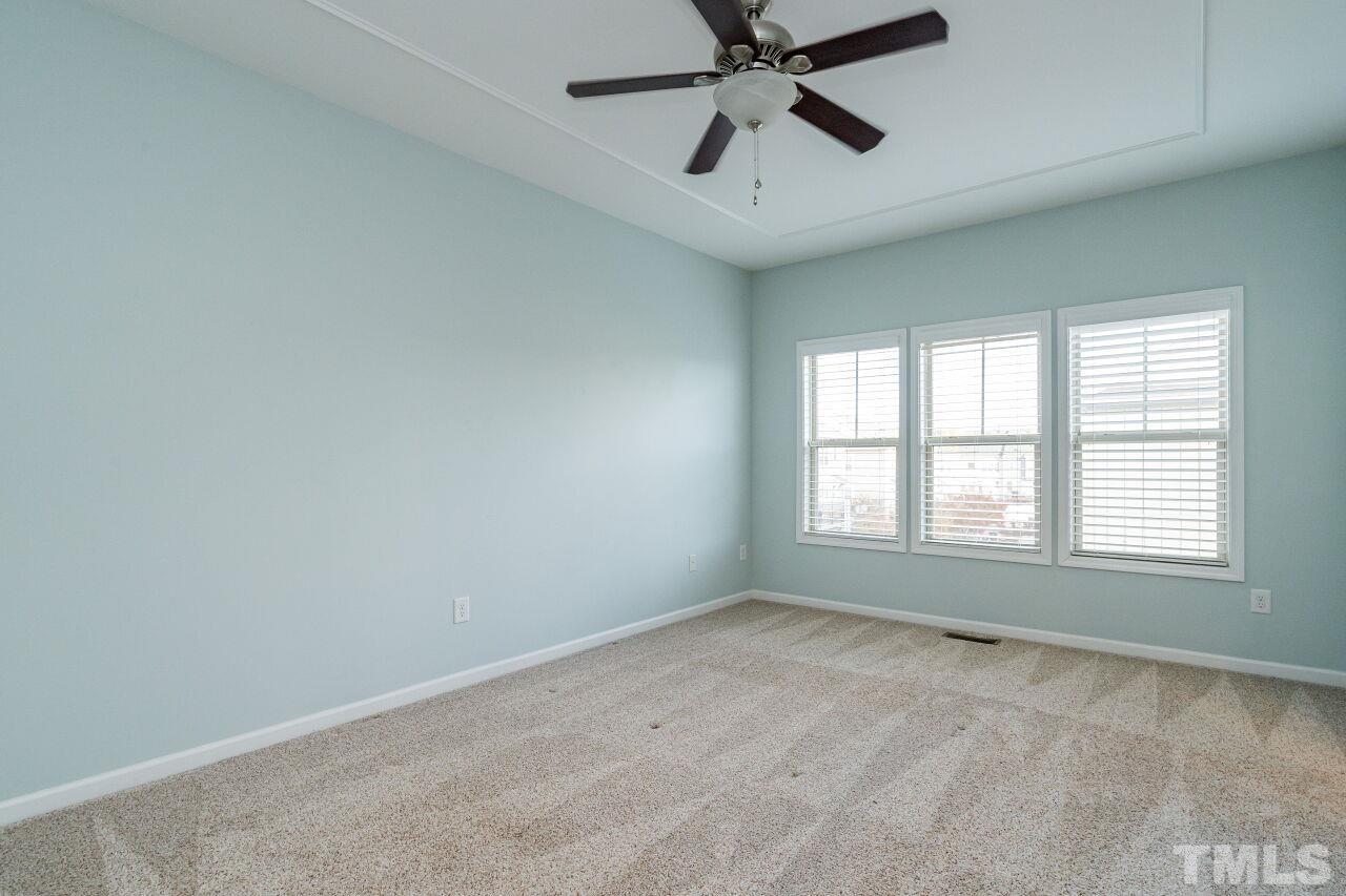 1323 Rodessa Run Raleigh, NC 27607 - Photo 22 of 29 a view of an empty room with a window