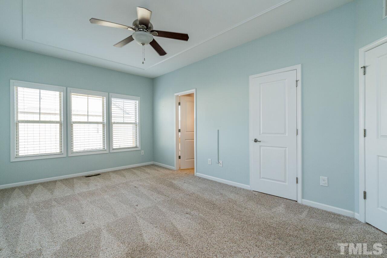 1323 Rodessa Run Raleigh, NC 27607 - Photo 23 of 29 a view of an empty room with a window