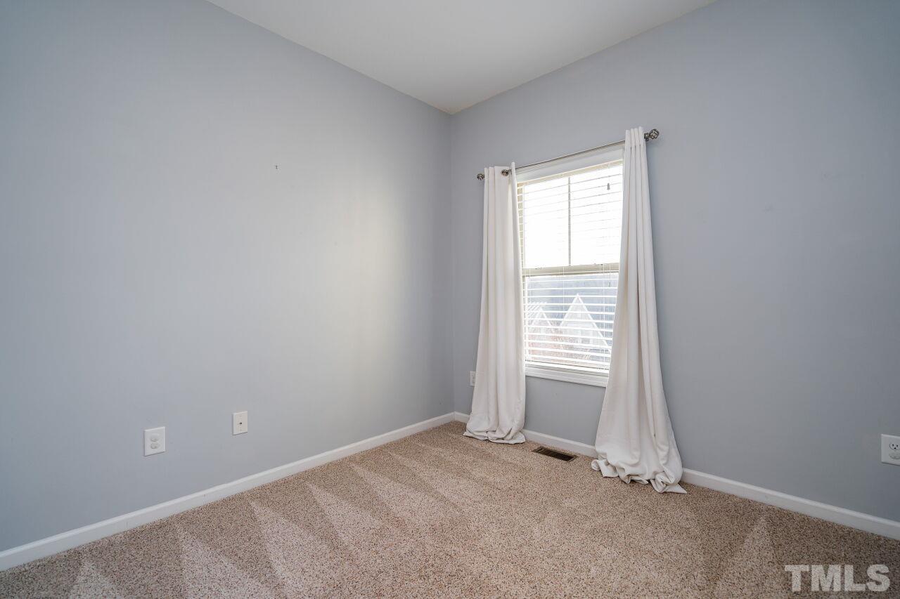 1323 Rodessa Run Raleigh, NC 27607 - Photo 28 of 29 an empty room with a window