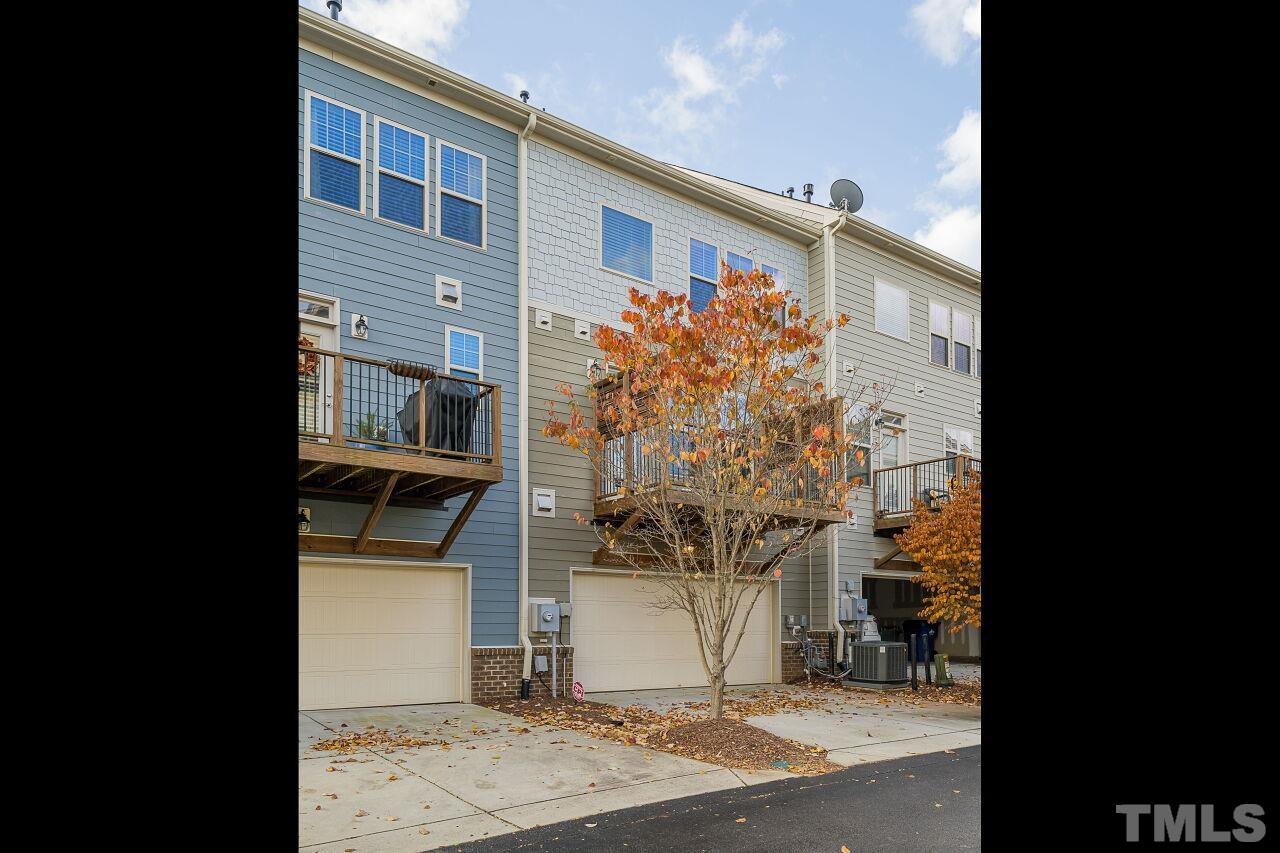 1323 Rodessa Run Raleigh, NC 27607 - Photo 29 of 29 a front view of a house with a yard