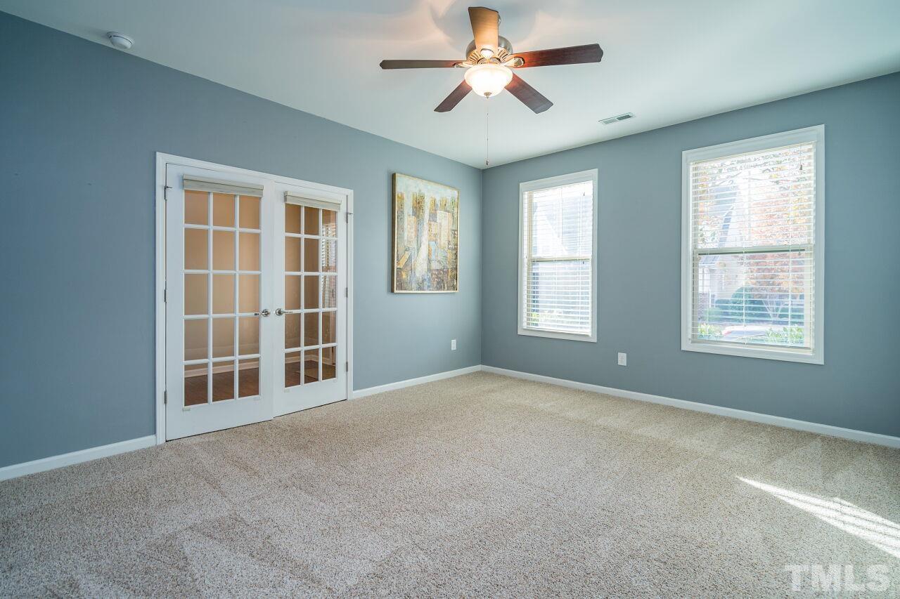 1323 Rodessa Run Raleigh, NC 27607 - Photo 5 of 29 a view of an empty room with a window