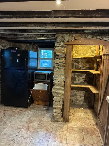 a view of storage and utility room