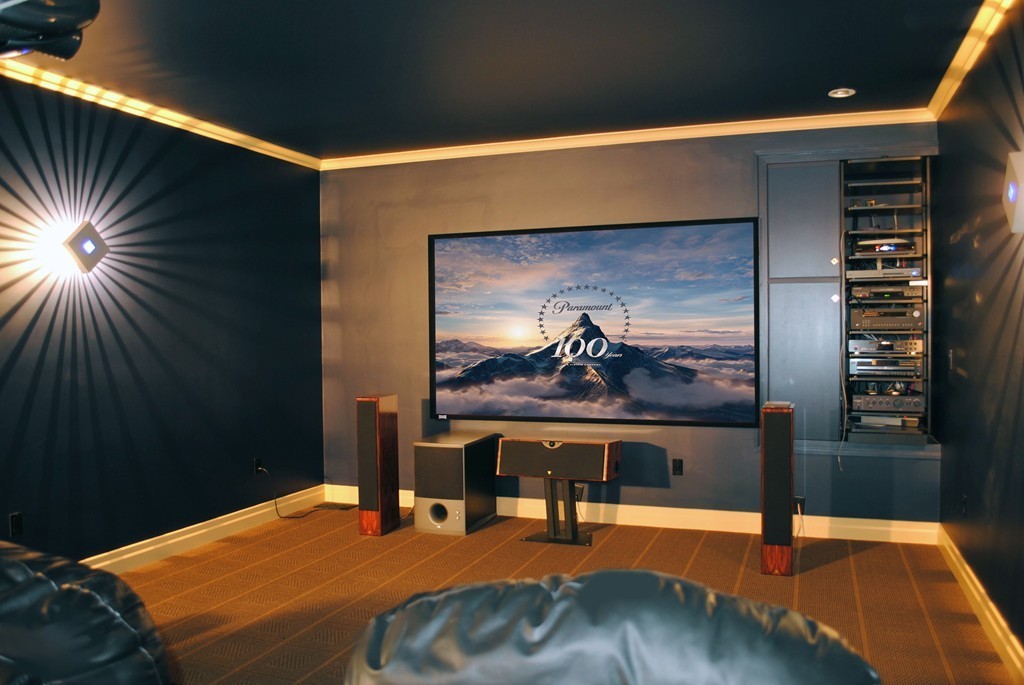 60 Oak Road Concord, MA 01742 - Photo 14 of 24 a room with a bed and a painting on the wall