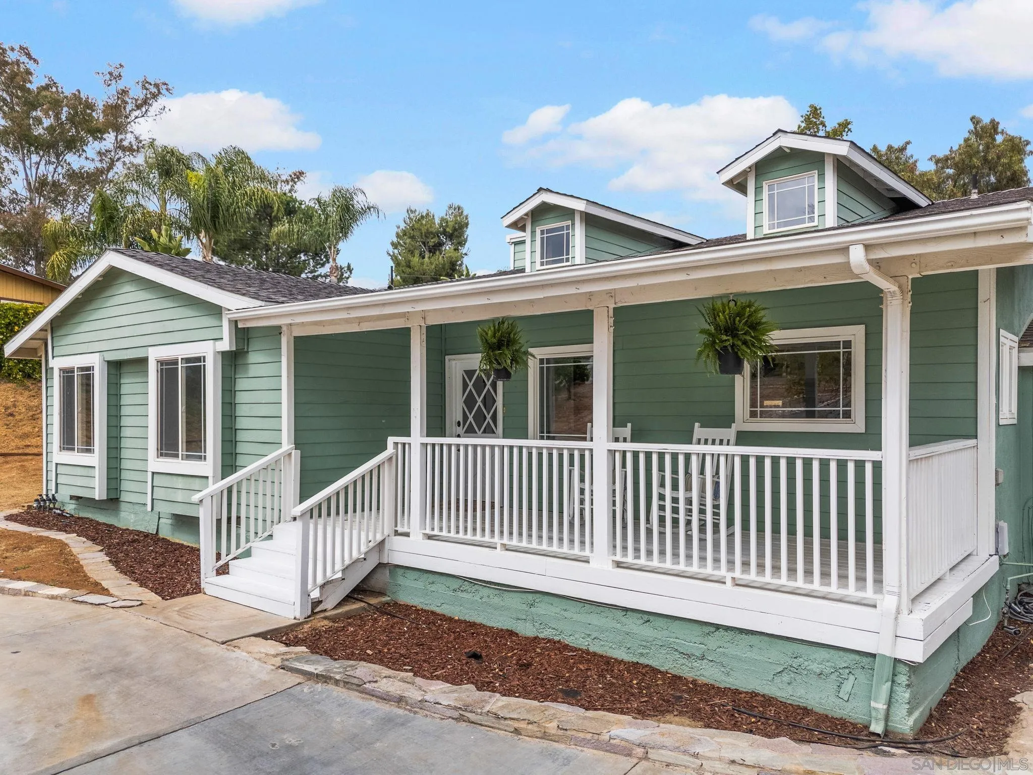 11507 Pinehurst Drive Lakeside, CA 92040 - Photo 2 of 25 a view of a house with a small yard and wooden fence