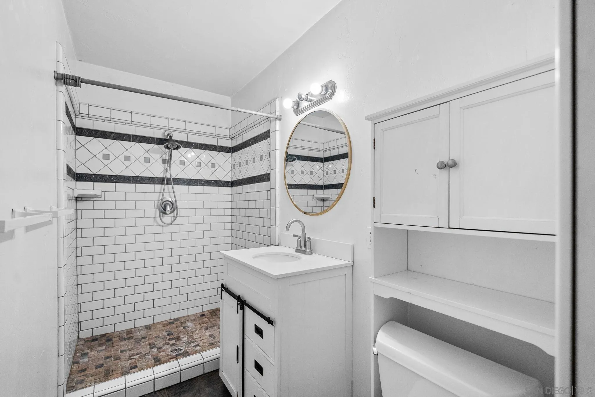 11507 Pinehurst Drive Lakeside, CA 92040 - Photo 24 of 25 a bathroom with a sink and a mirror