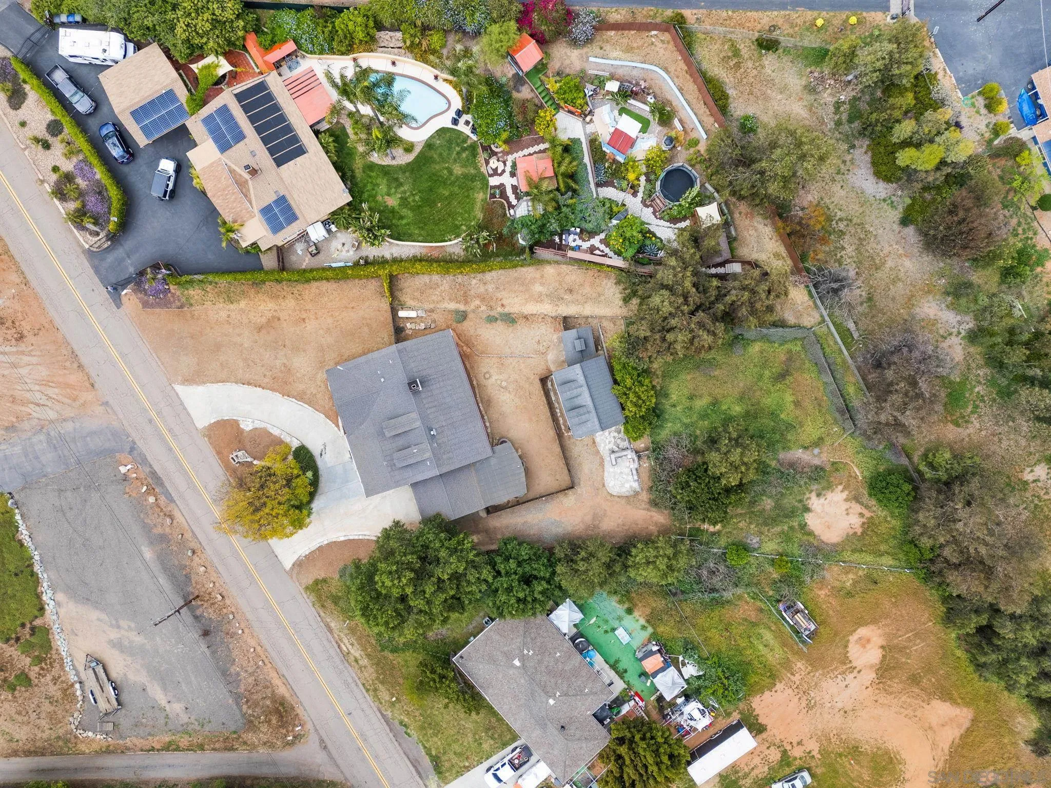 11507 Pinehurst Drive Lakeside, CA 92040 - Photo 4 of 25 an aerial view of a house with a yard and a large tree