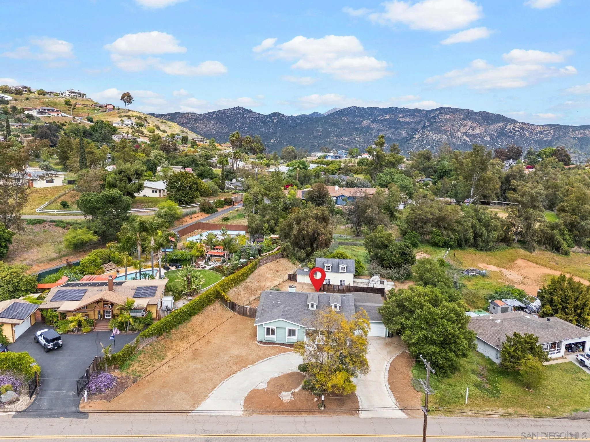 11507 Pinehurst Drive Lakeside, CA 92040 - Photo 5 of 25 a front view of a house with a mountain