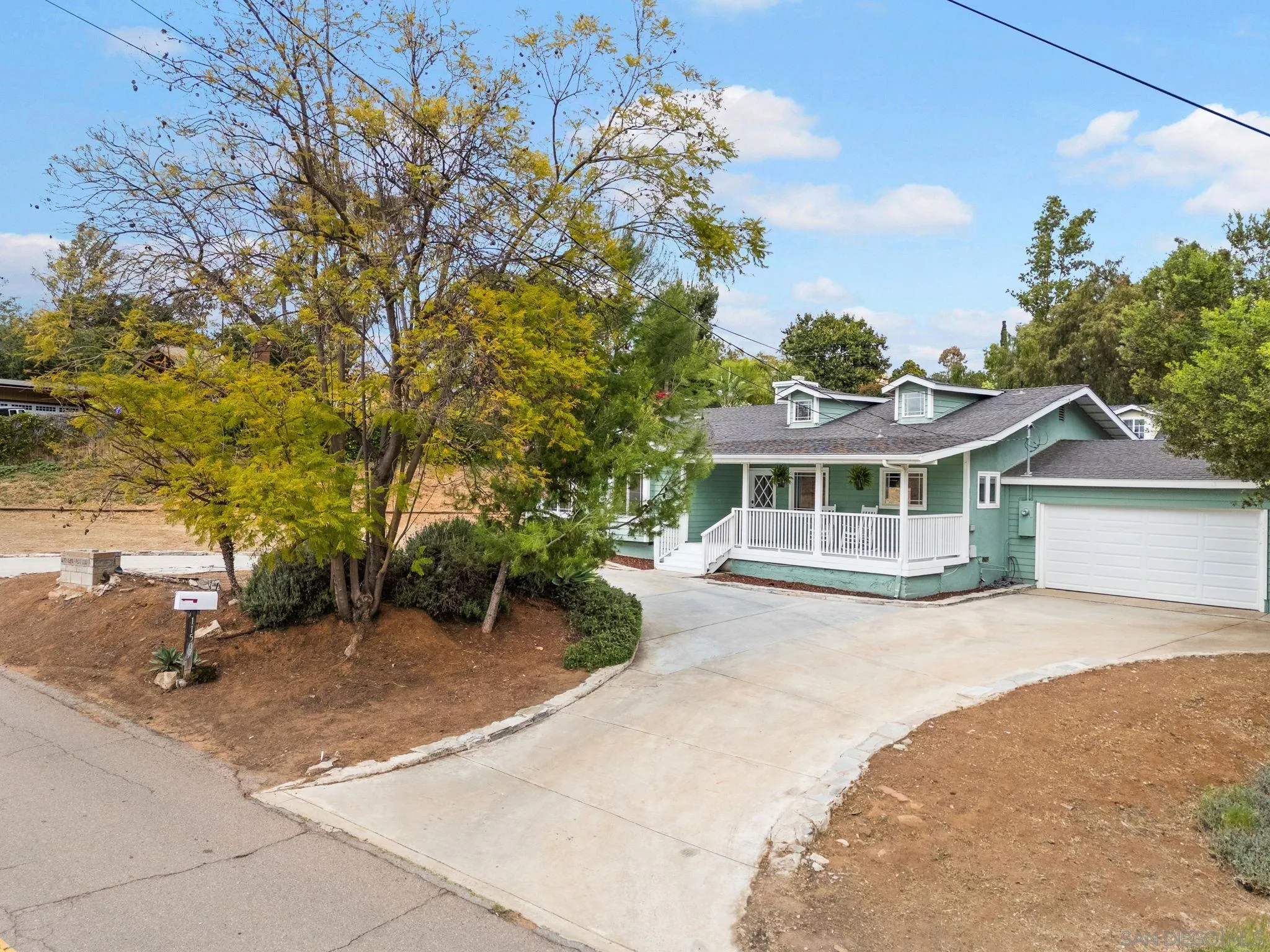 11507 Pinehurst Drive Lakeside, CA 92040 - Photo 6 of 25 front view of a house with a garden