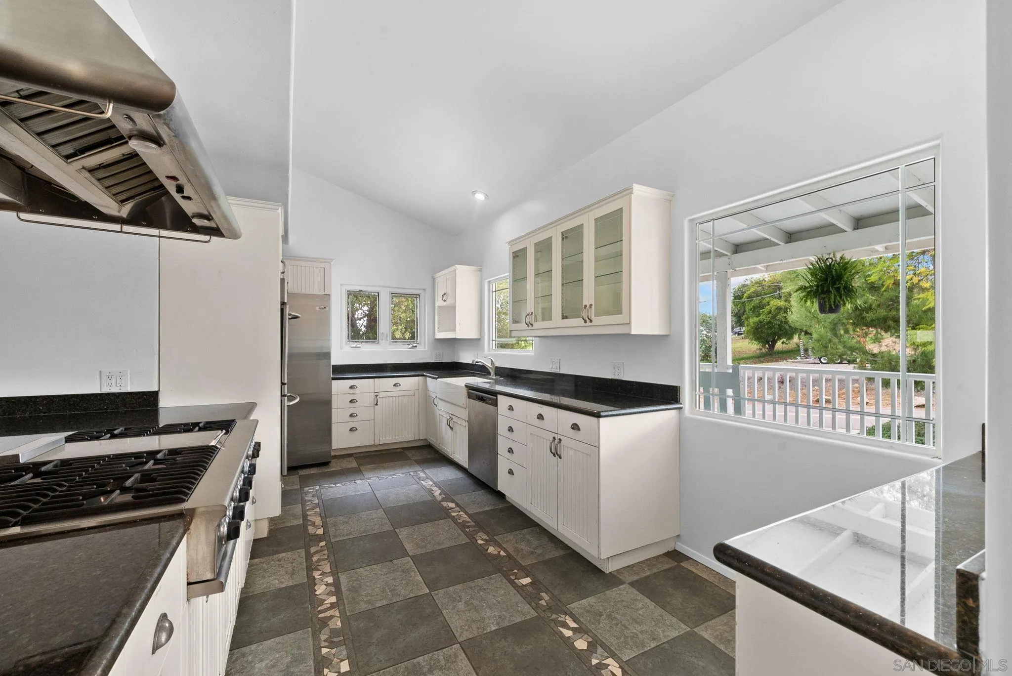 11507 Pinehurst Drive Lakeside, CA 92040 - Photo 8 of 25 a kitchen with stainless steel appliances a stove a sink and a refrigerator