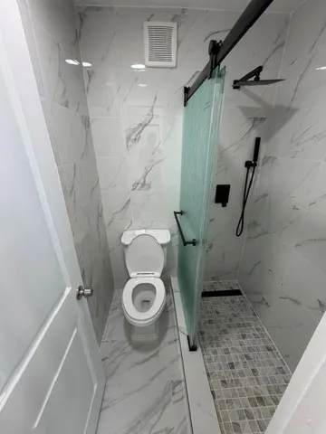 a bathroom with a sink and a toilet