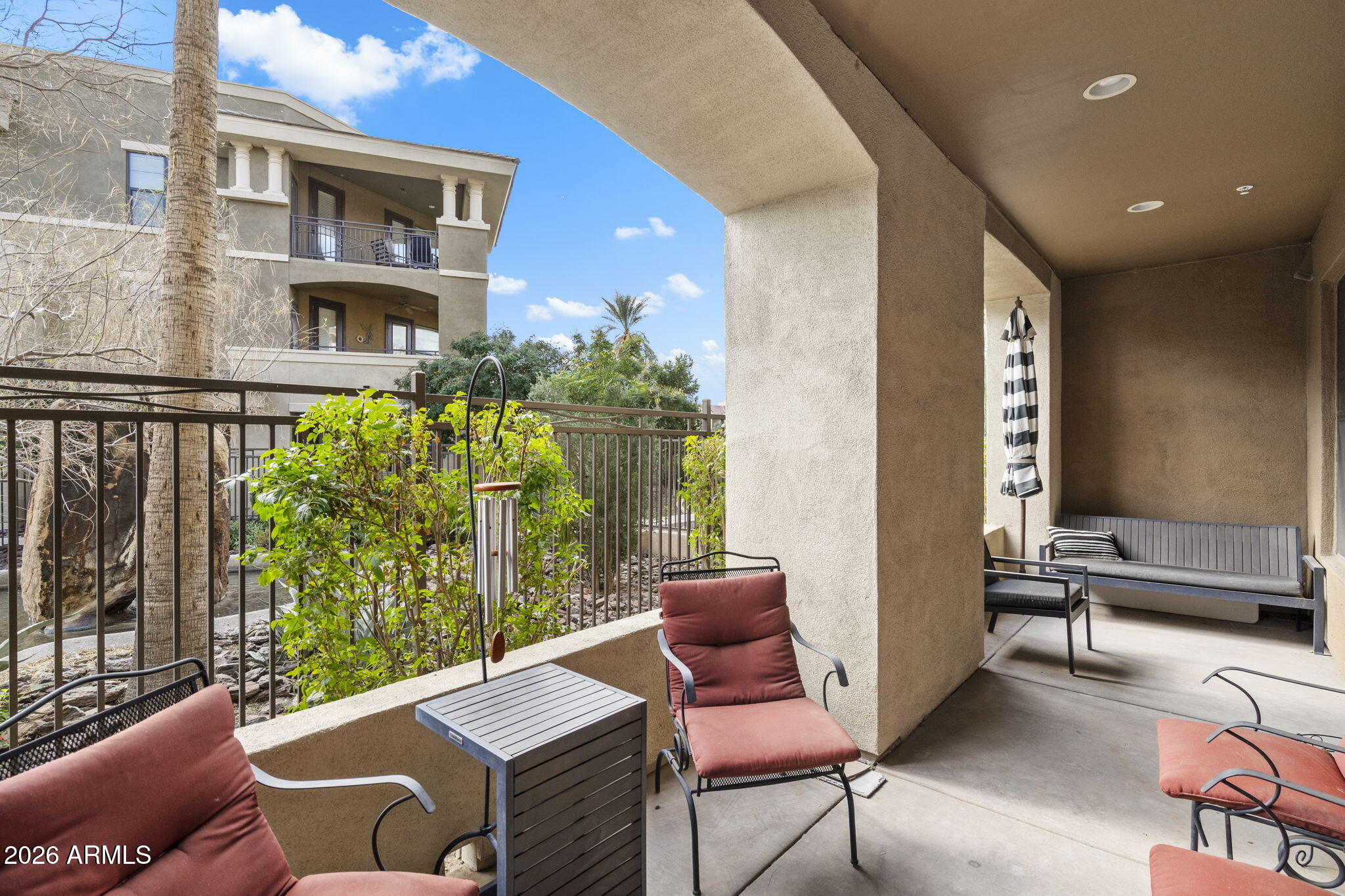 7601 East Indian Bend Road, Unit 1012 Scottsdale, AZ 85250 - Photo 23 of 27 a outdoor living space with furniture