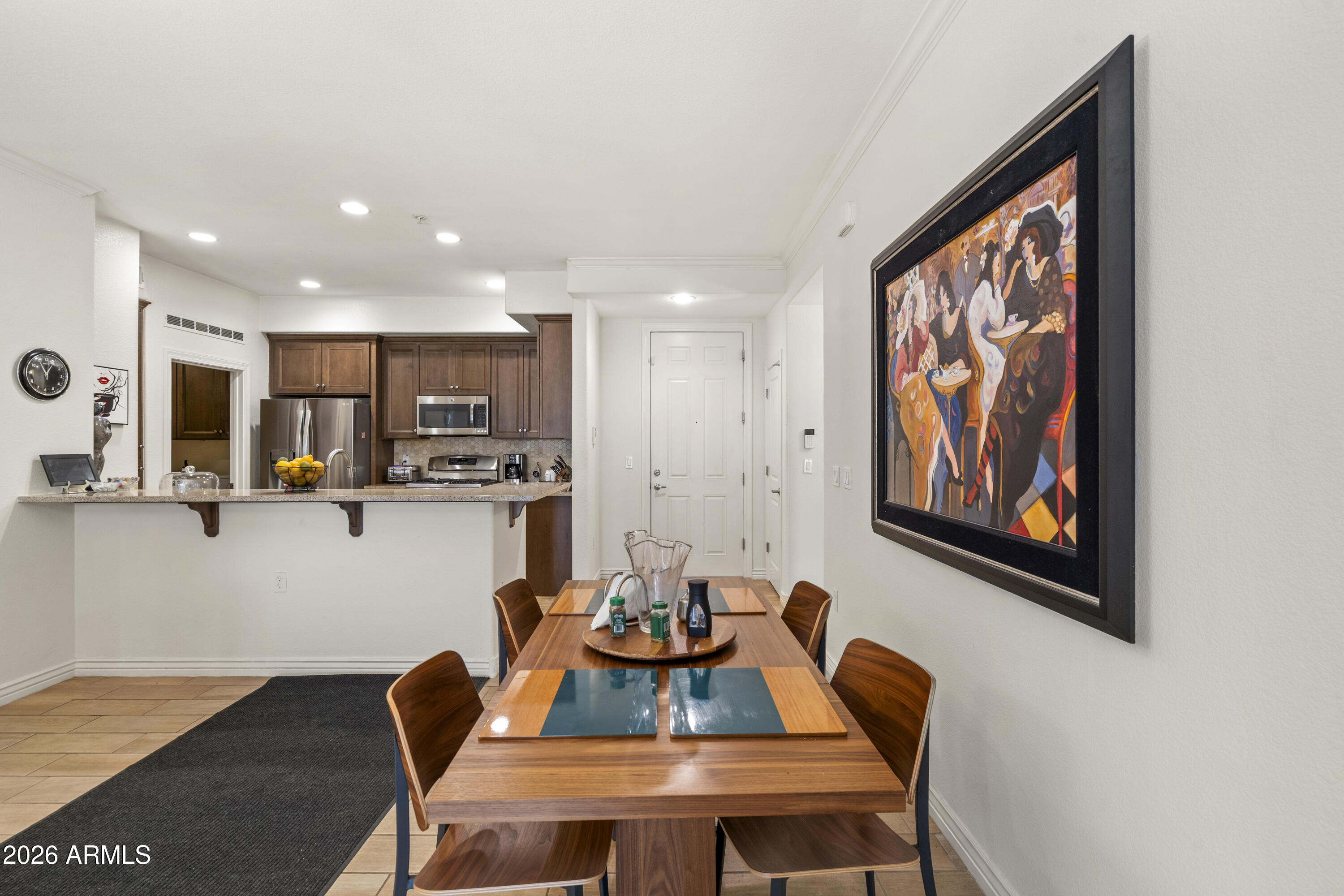 7601 East Indian Bend Road, Unit 1012 Scottsdale, AZ 85250 - Photo 9 of 27 a view of a dining room with furniture