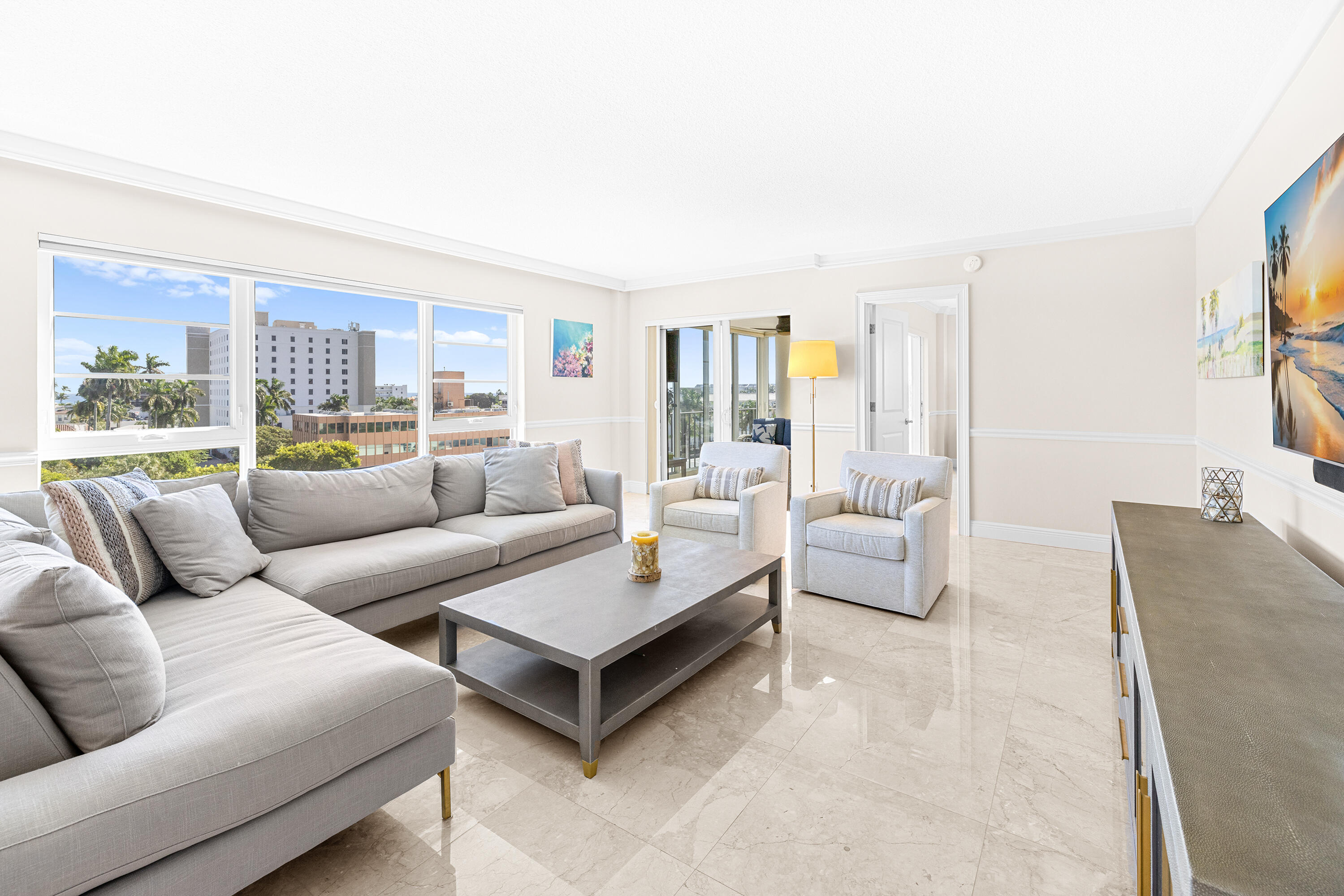 50 E Road, Unit 6E Delray Beach, FL 33483 - Photo 5 of 36 a living room with furniture and a large window