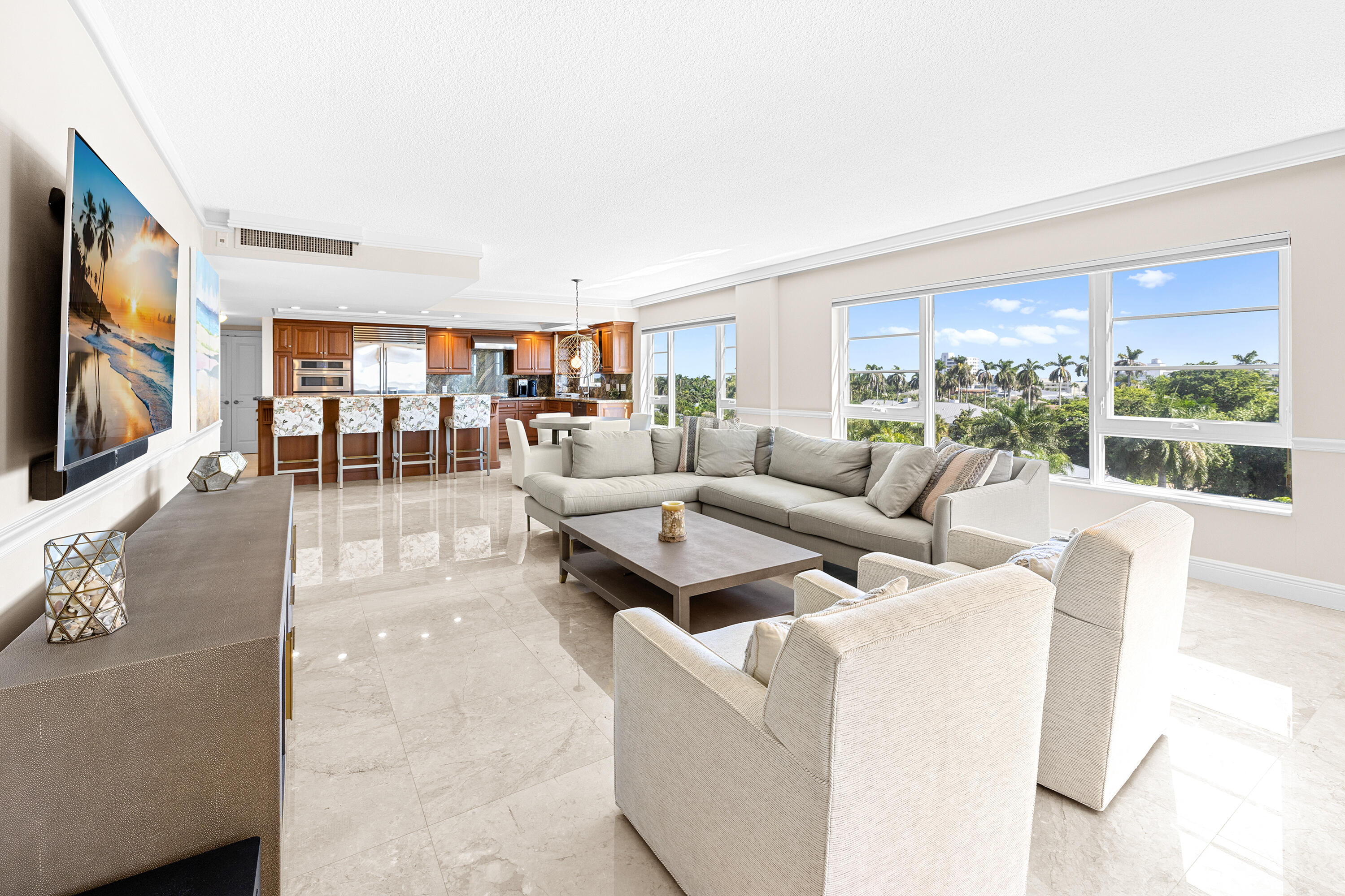 50 E Road, Unit 6E Delray Beach, FL 33483 - Photo 7 of 36 a living room with furniture and a flat screen tv