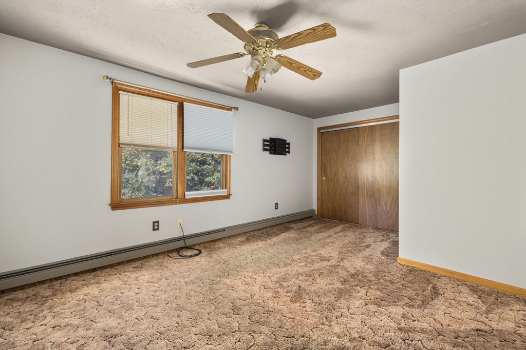 40 Union Street Blackstone, MA 01504 - Photo 28 of 40 a view of an empty room with a window