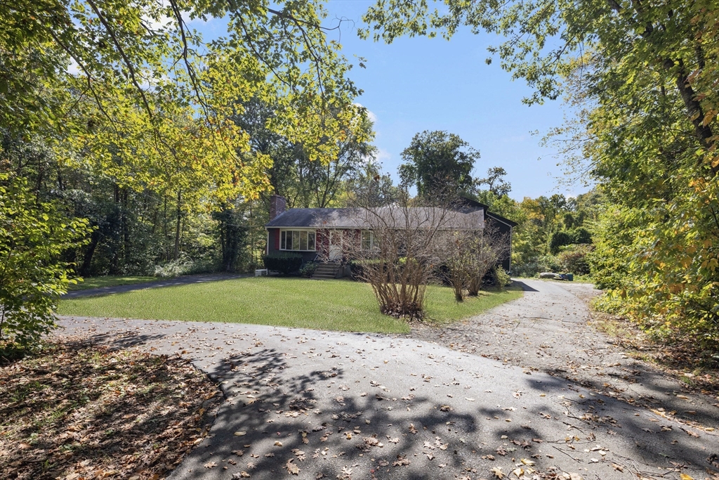 40 Union Street Blackstone, MA 01504 - Photo 3 of 40 a view of a yard in front of a house