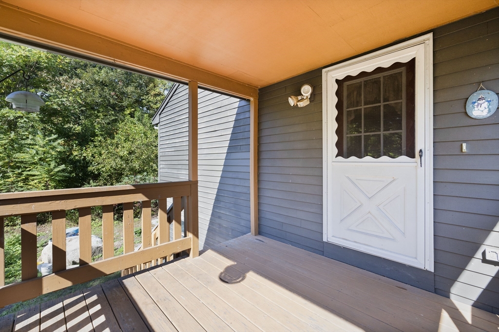 40 Union Street Blackstone, MA 01504 - Photo 36 of 40 a view of wooden deck and a yard