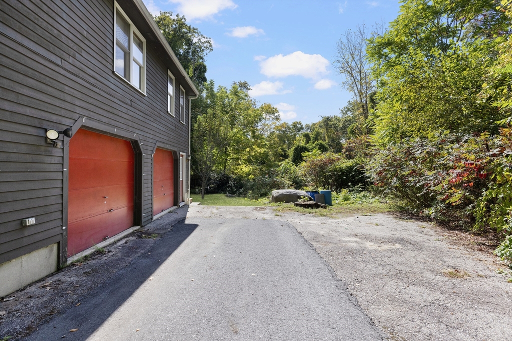 40 Union Street Blackstone, MA 01504 - Photo 4 of 40 a view of a house with a yard