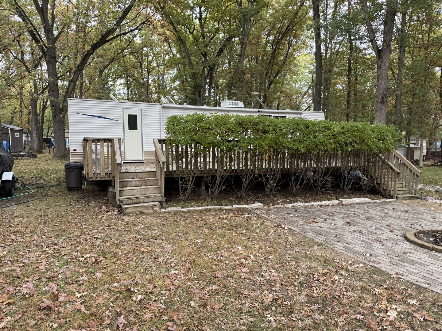 1-108 Woodhaven Lakes Sublette, IL 61367 - Photo 1 of 17 a view of a house with a yard