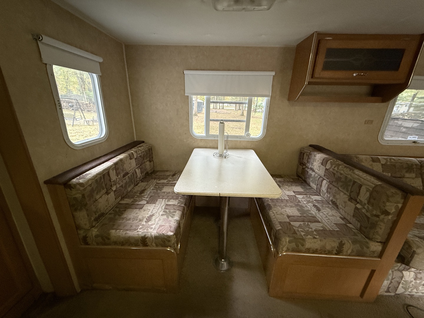 1-108 Woodhaven Lakes Sublette, IL 61367 - Photo 12 of 17 a living room with furniture and a window