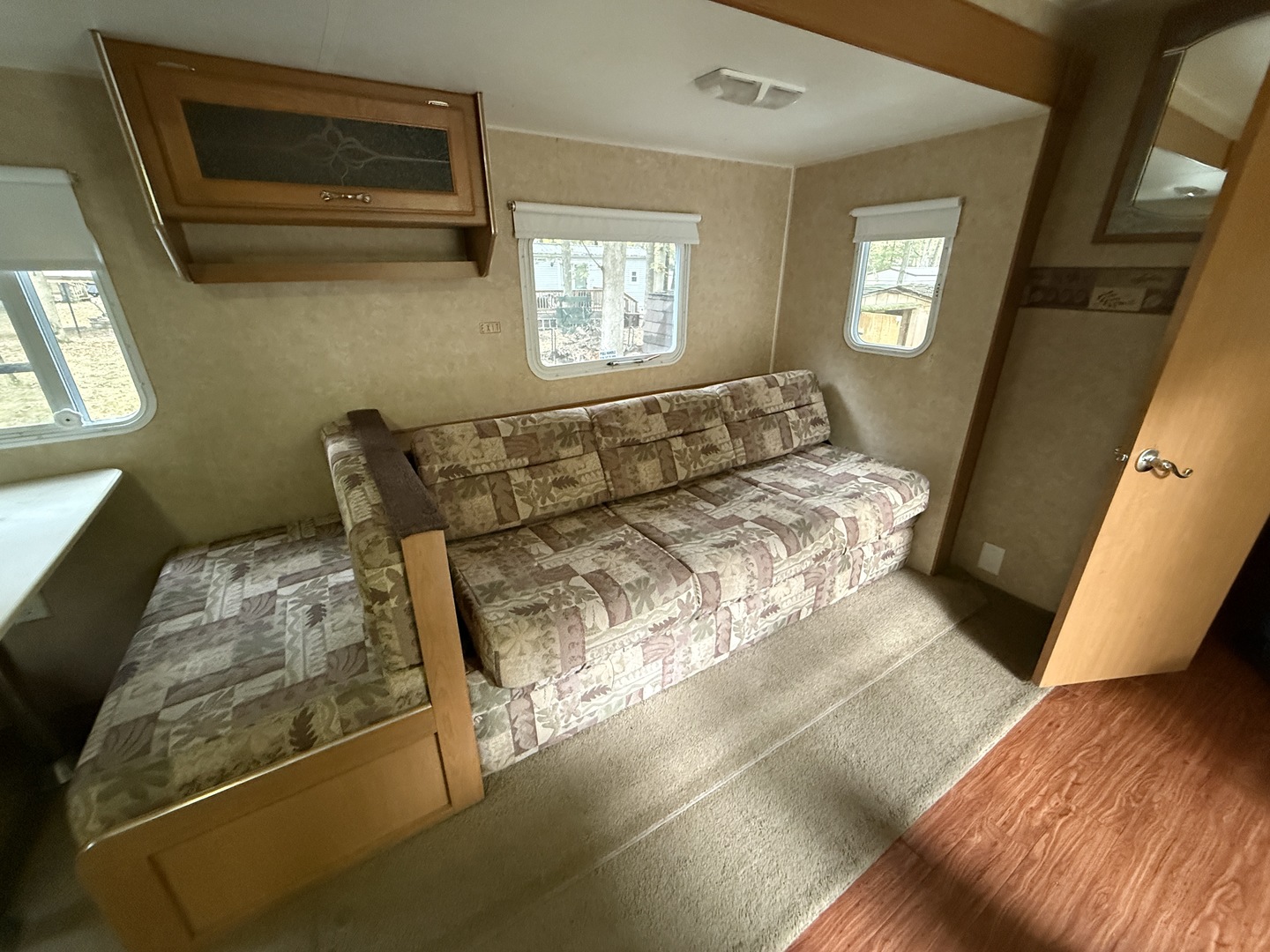 1-108 Woodhaven Lakes Sublette, IL 61367 - Photo 14 of 17 a living room with furniture and a window