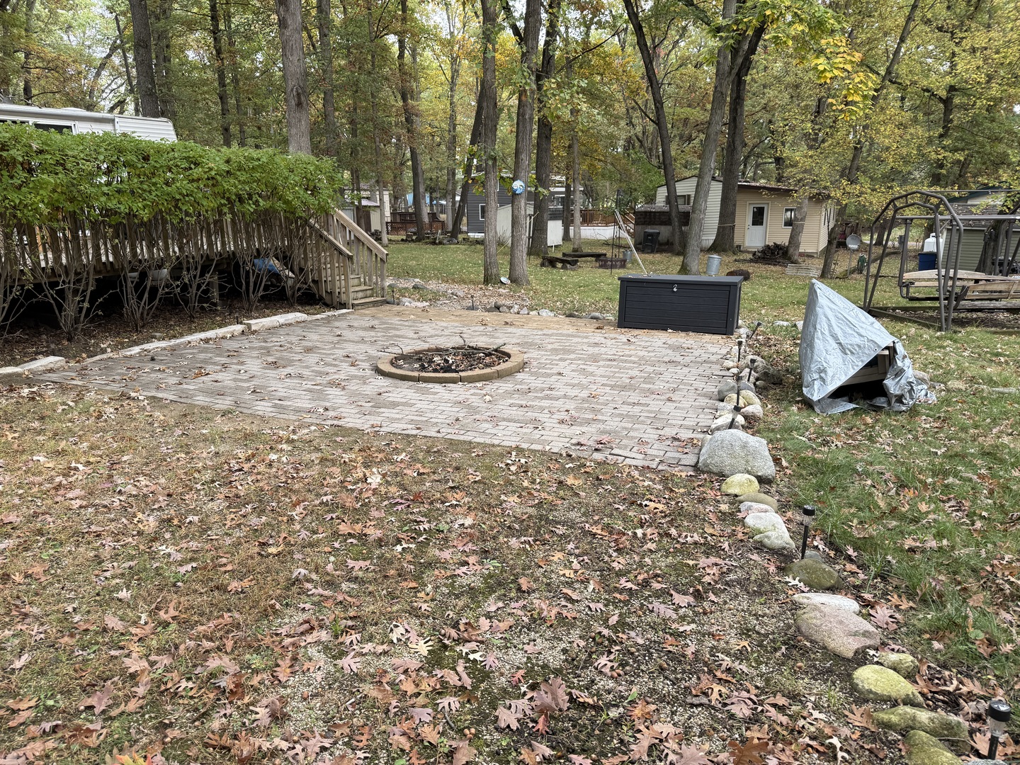 1-108 Woodhaven Lakes Sublette, IL 61367 - Photo 2 of 17 a view of backyard of house with outdoor seating