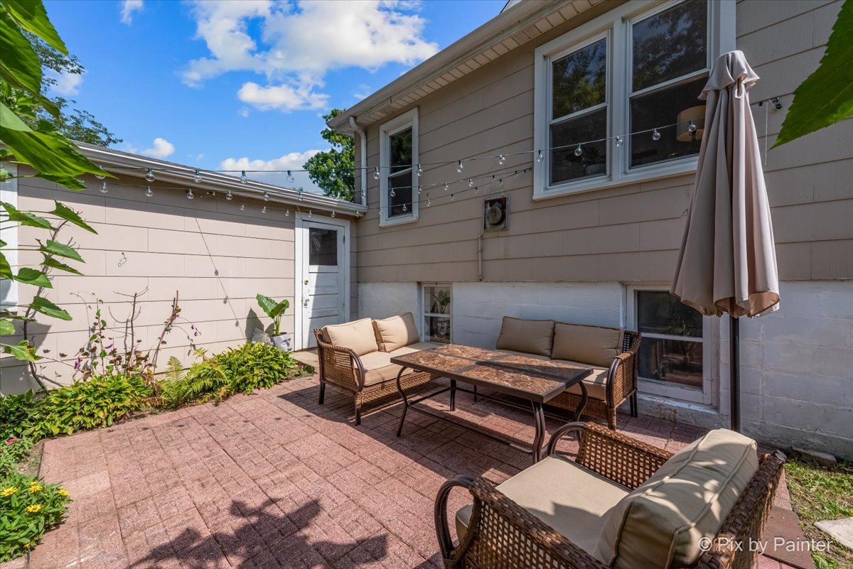 302 Circle Road Fox River Grove, IL 60021 - Photo 21 of 35 a view of backyard with outdoor seating and plants