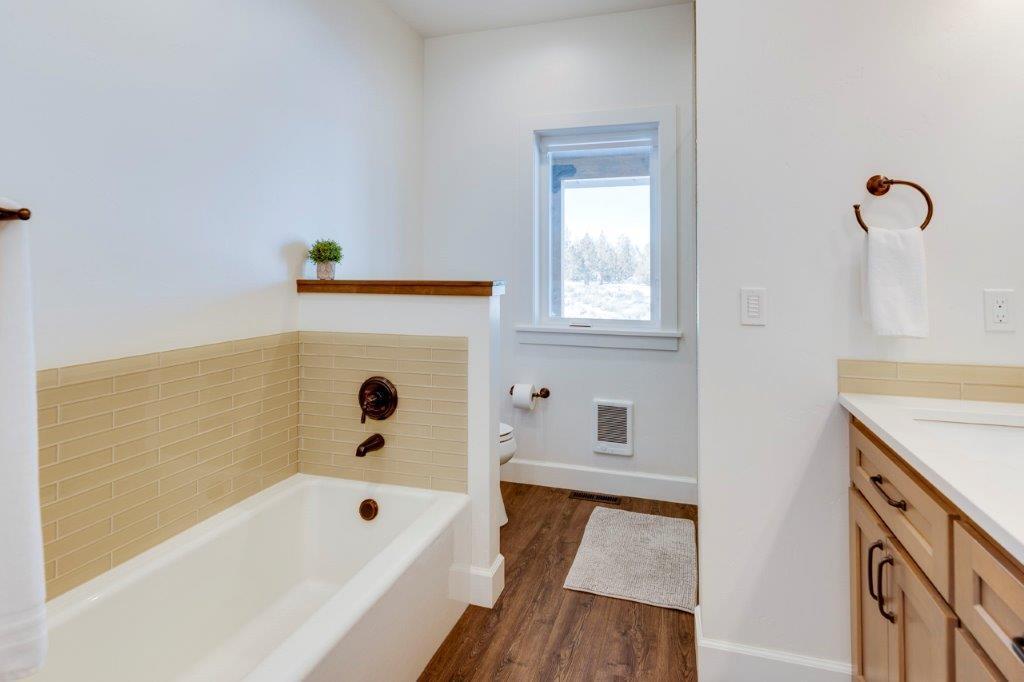 8962 Southwest Copley Road Powell Butte, OR 97753 - Photo 16 of 46 Soak your troubles away in this oversized cast iron bathtub.