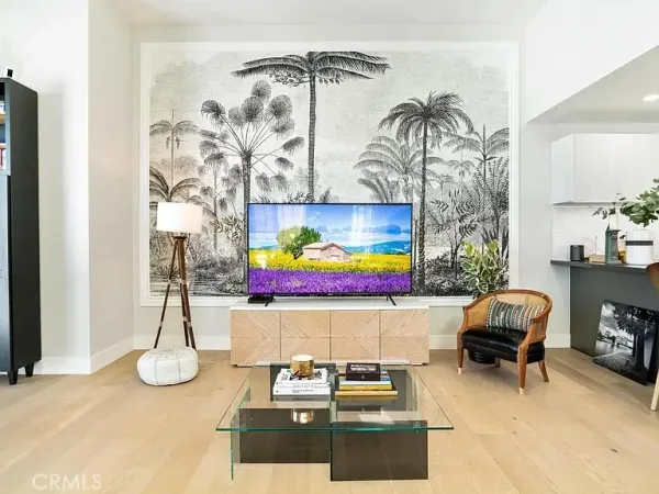 a room with lots of cabinet and a painting on the wall