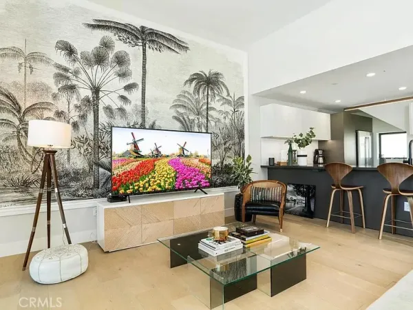 a room with gym equipment and view of living room