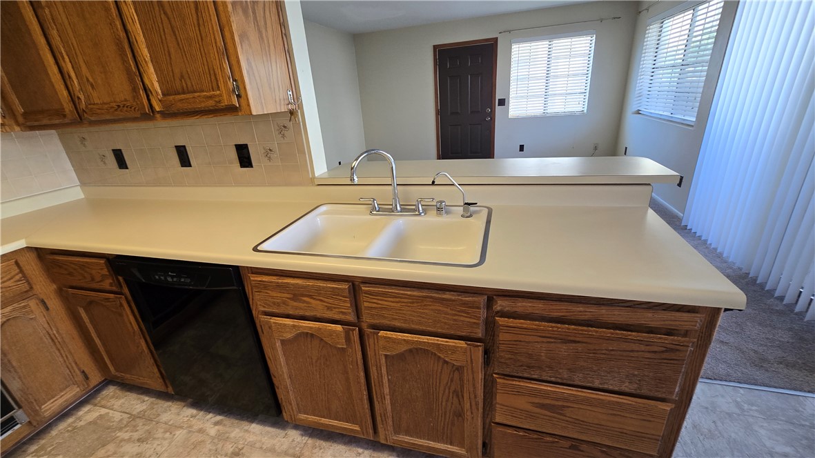 1190 Ramar Road, Unit 27 Bullhead City, AZ 86442 - Photo 10 of 15 a bathroom with a sink and a mirror