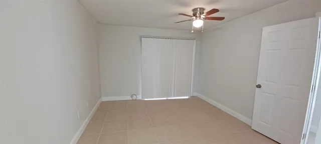 a bathroom with a sink vanity and mirror