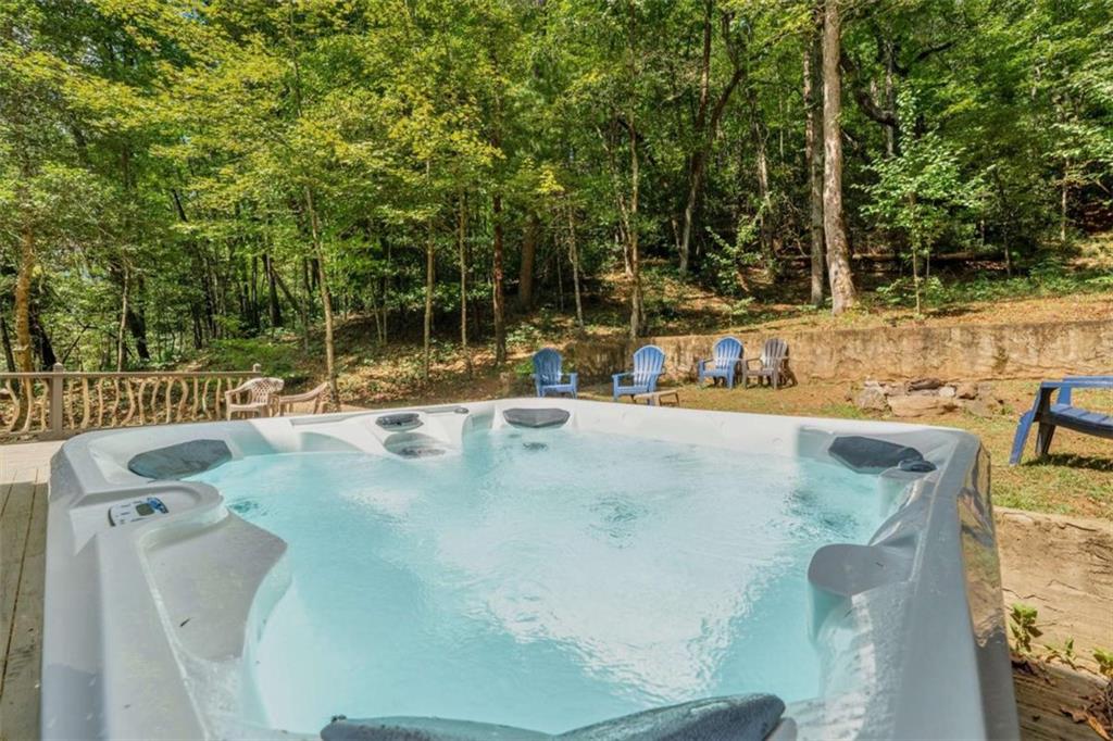383 Canada Creek Road West Suches, GA 30572 - Photo 12 of 30 a view of a swimming pool with a patio