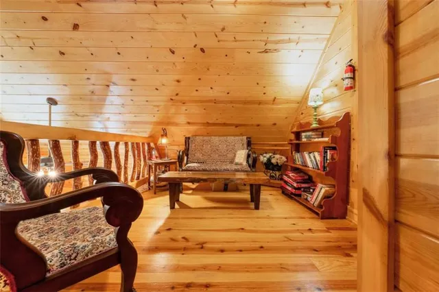 a view of a balcony with chairs