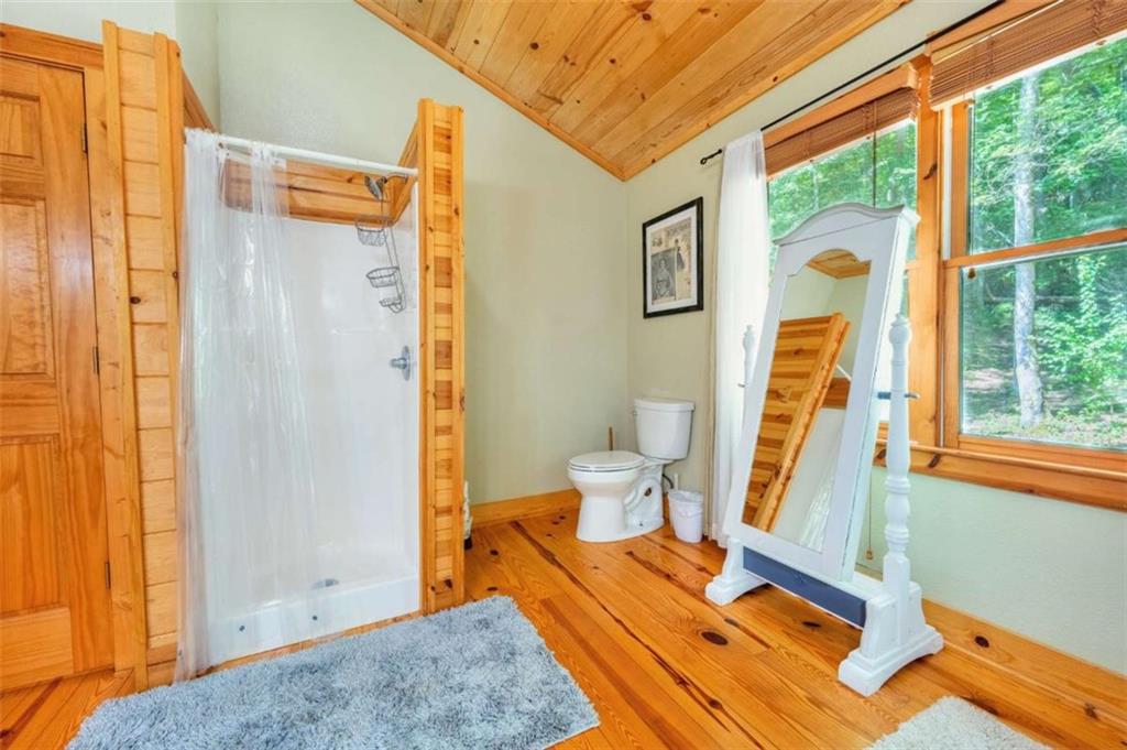 383 Canada Creek Road West Suches, GA 30572 - Photo 26 of 30 a front view of a house with wooden floor and a potted plant