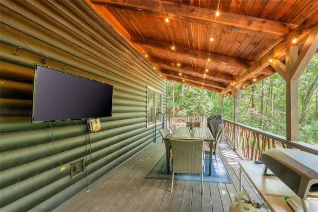 a view of a chairs on the roof deck
