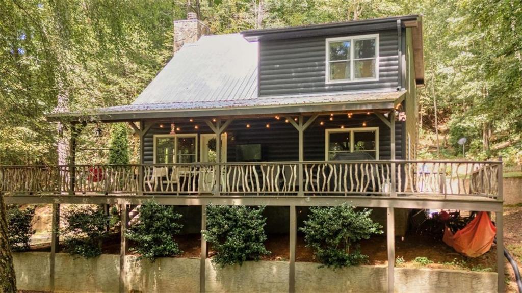 383 Canada Creek Road West Suches, GA 30572 - Photo 5 of 30 a house view with a garden space