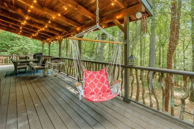 a balcony with wooden floor