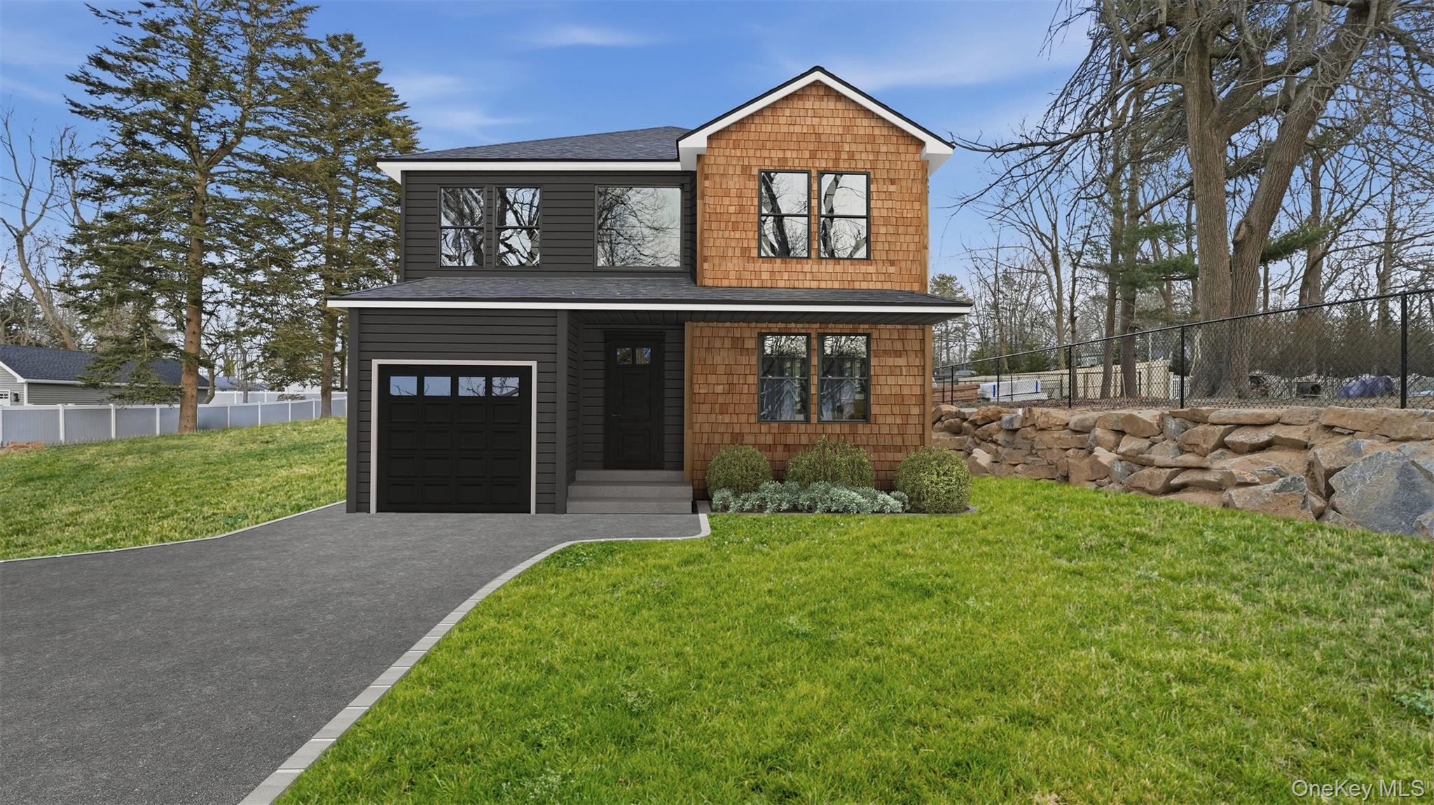 Rendering of Residence featuring a shingled roof, asphalt driveway, and an attached garage