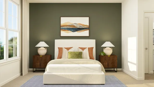 a bedroom with a bed and window