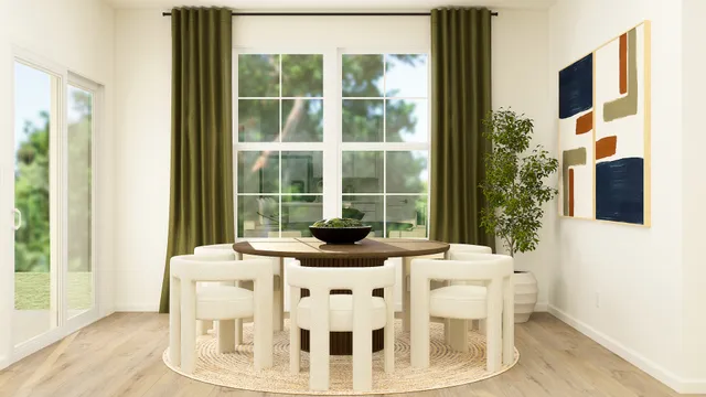 a view of a dining room with furniture and windows