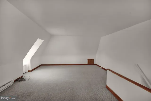 a view of a room with a hallway