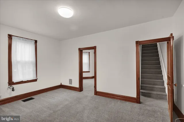 an empty room with windows