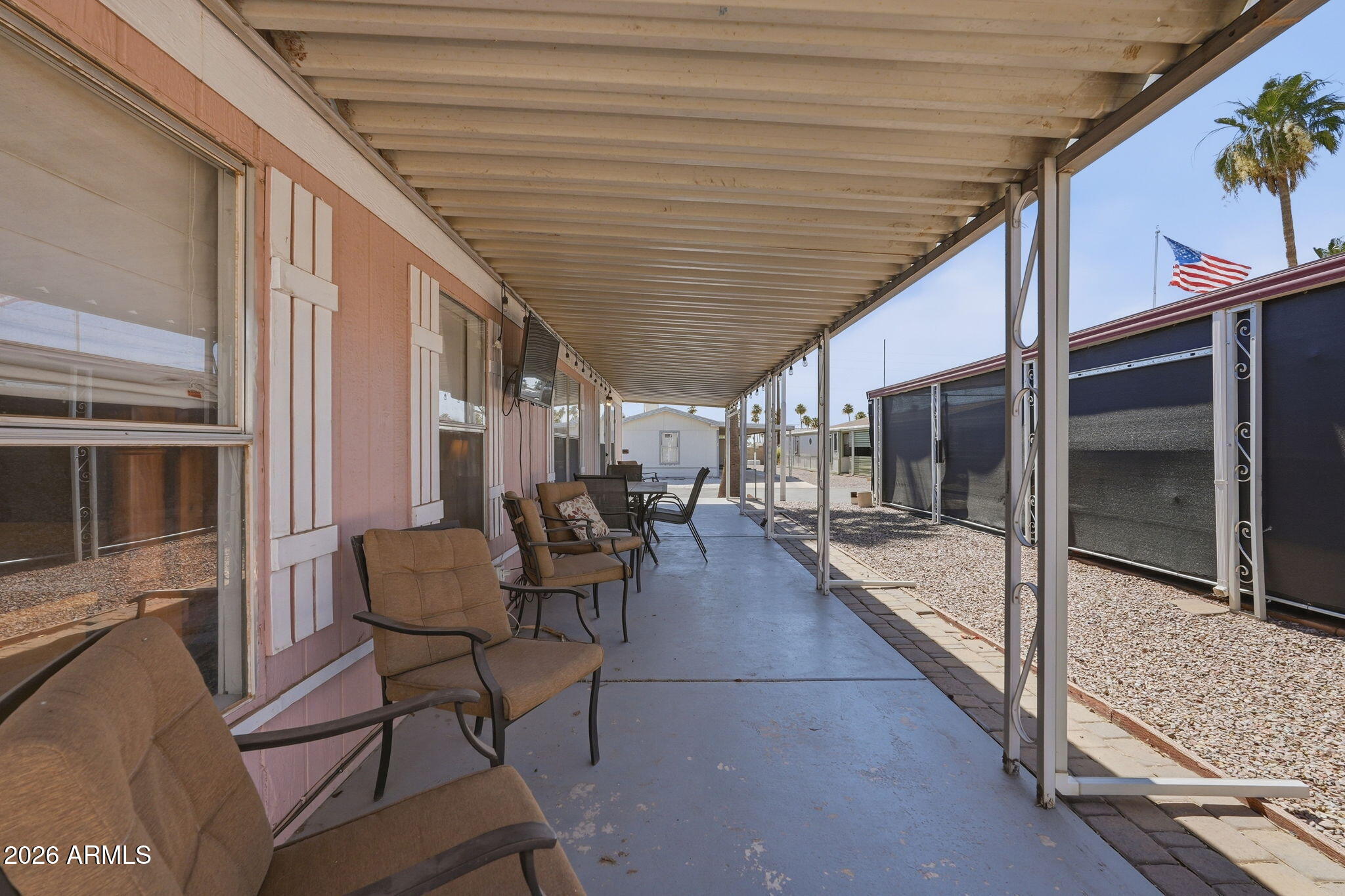 53 North Mountain Road, Unit 38 Apache Junction, AZ 85120 - Photo 34 of 35 a outdoor space with chairs